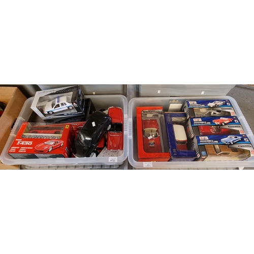 430 - Two boxes of assorted diecast model vehicles some in original boxes to include: Maisto Assembly Line... 