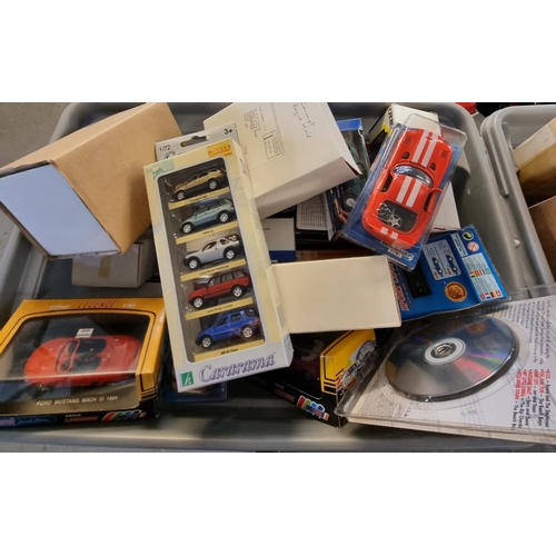 440 - Three boxes of assorted diecast model vehicles and other items to include: Hot Wheels, Solido, Corgi... 