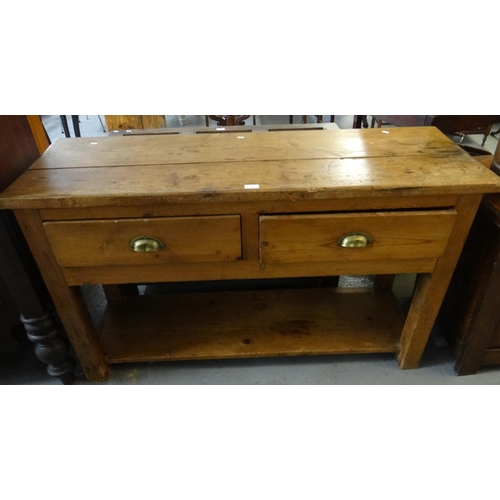 486 - Early 20th century rustic pine dresser base, the moulded top above two drawers with pot base and squ... 