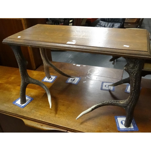 489 - Small oak side/lamp table, the legs formed as antler horns. (A marriage)  70x33x43cm approx.  (B.P. ... 