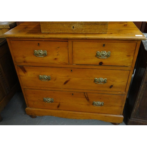 502 - Early 20th century pine straight front chest of two short and two long drawers on platform base and ... 