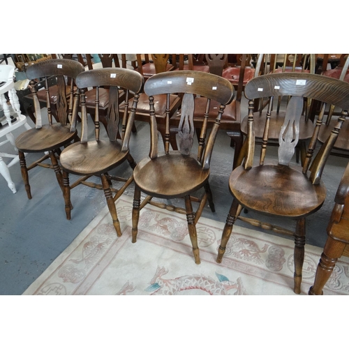 508 - Set of four early 20th century elm splat and spindle back farmhouse kitchen chairs on circular solid... 