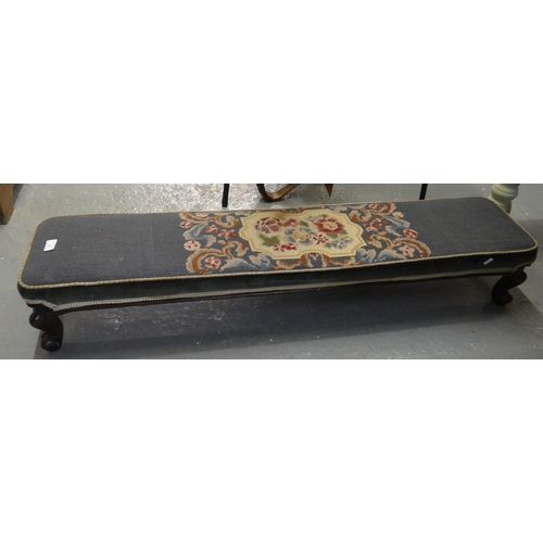 532 - Victorian footstool of low proportions on stained wooden cabriole legs and scroll feet with floral t... 