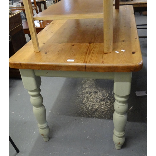 533 - Modern pine kitchen table on painted baluster turned legs.  137x74x76cm approx.  (B.P. 21% + VAT)