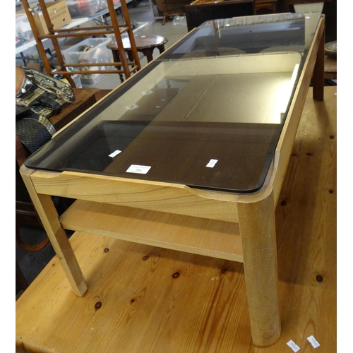 534 - Mid century beech smokey glass top coffee table with under tier.  (B.P. 21% + VAT)