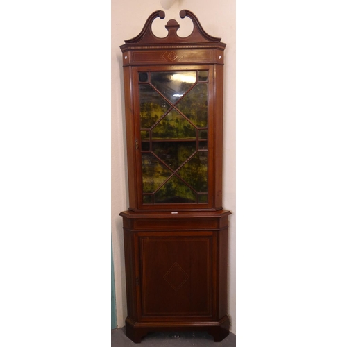 541 - Edwardian mahogany inlaid astragal glazed two stage corner cabinet.
(B.P. 21% + VAT)