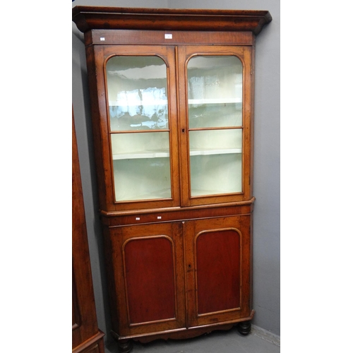 554 - Victorian oak two stage glazed corner cabinet with fixed shaped shelves. 
(B.P. 21% + VAT)