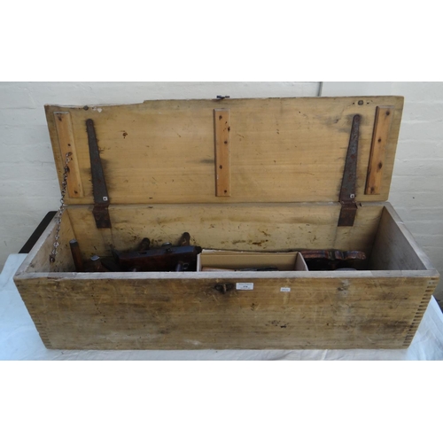 570 - Pine carpenter's tool box containing assorted tolls including: saws, brace and bit, block planes, pl... 