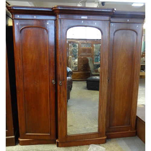 572 - Victorian mahogany break front mirrored triple section wardrobe.
(B.P. 21% + VAT)