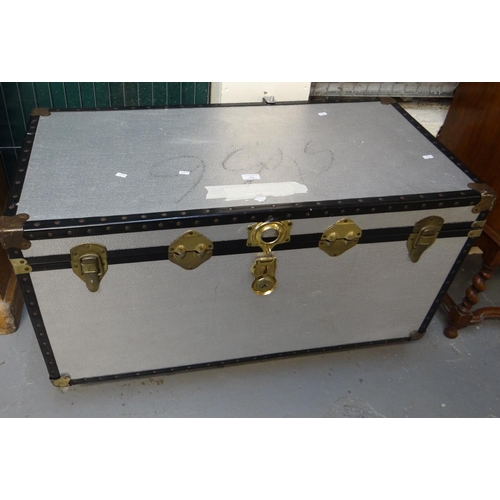 574 - Large aluminium travelling trunk.   (B.P. 21% + VAT)