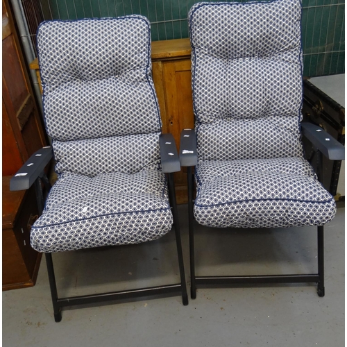 576 - Pair of folding reclining garden chairs with loose cushions, pair of stained wooden garden chairs an... 