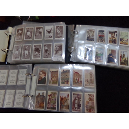 66 - Cigarette cards selection of mostly sets on pages, in three albums: Ogdens, Churchman, Carreras, Phi... 