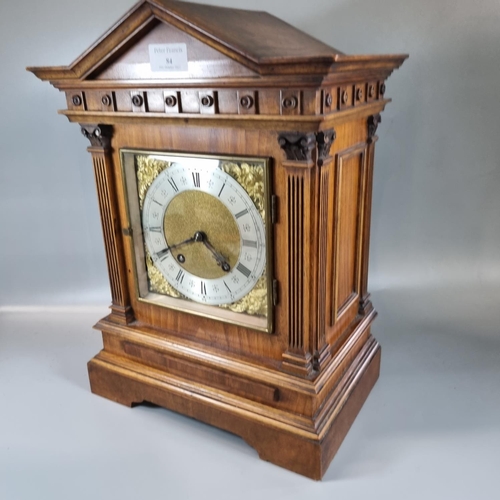 84 - Early 20th century walnut architectural two train mantle clock, with silver chapter ring and Roman n... 