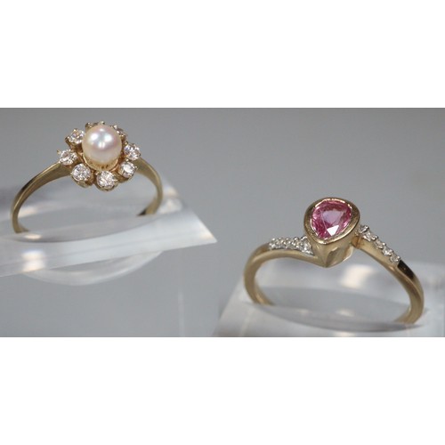 246 - Two 9ct gold dress rings, one of pearl and flowerhead design.  3.2g approx.  Sizes M1/2 and I1/2.  (... 