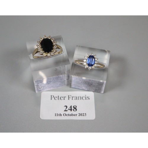 248 - Two 9ct gold blue, black and clear stone dress rings.  Size Q and P.  (2)  (B.P. 21% + VAT)