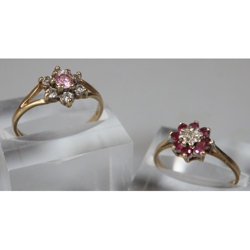 252 - Two 9ct gold pink, red and clear stone flowerhead dress rings.  Sized L1/2 and M1/2.  (2)  (B.P. 21%... 