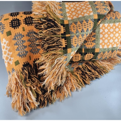 166 - Orange ground vintage woollen Welsh tapestry traditional Caernarfon design blanket with fringed edge... 