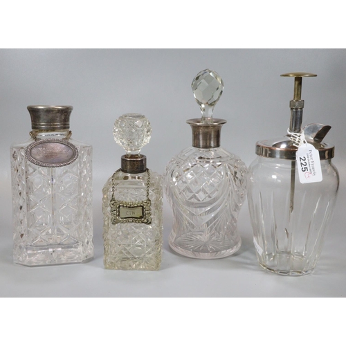 225 - Collection of lead crystal decanters and stoppers, some with silver collars, one with a plated whisk... 