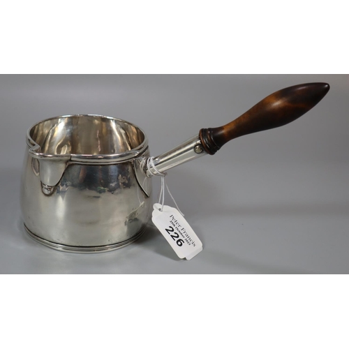 226 - Georgian silver brandy pan with turned wooden handle, London 1806, indistinct maker's mark.  Total w... 