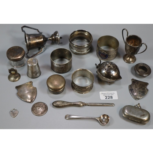 228 - Bag of silver and silver plate to include: miniature two handled trophy cups, napkin rings, pill box... 