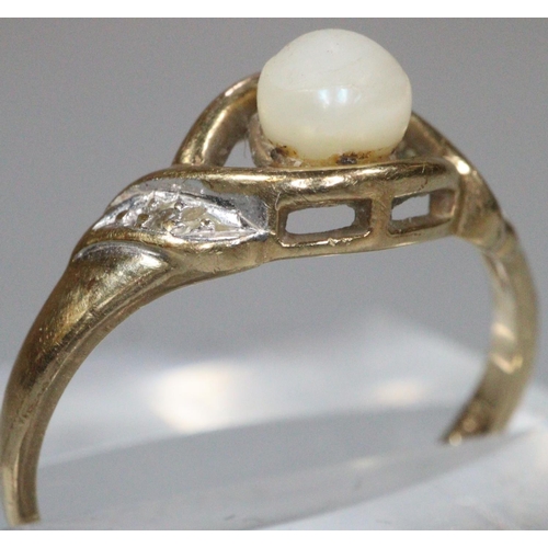 232 - 9ct gold and faux pearl dress ring.  1.4g approx.  Size K.   (B.P. 21% + VAT)