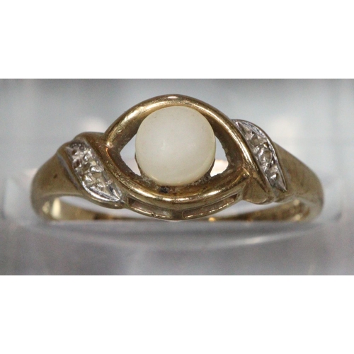 232 - 9ct gold and faux pearl dress ring.  1.4g approx.  Size K.   (B.P. 21% + VAT)