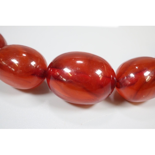 245 - 1930s Cherry Bakelite necklace.  40g approx.    (B.P. 21% + VAT)