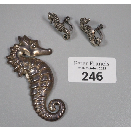 246 - Silver seahorse brooch an a pair of matching earrings marked Sterling.   (B.P. 21% + VAT)