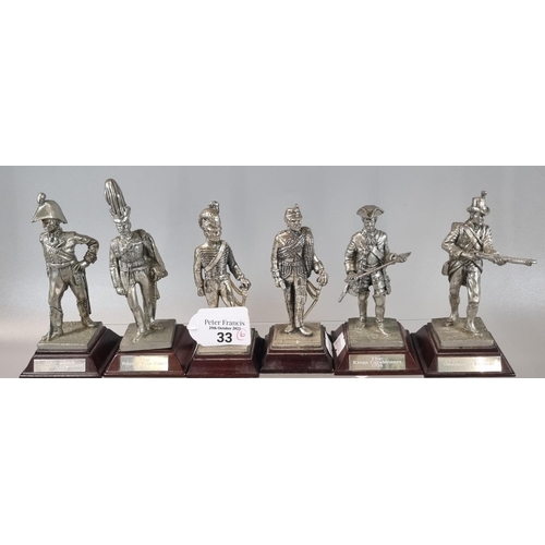 33 - Group of six polished pewter soldiers, to include: The Prince of Wales Hussars, The 22nd Cheshire Re... 