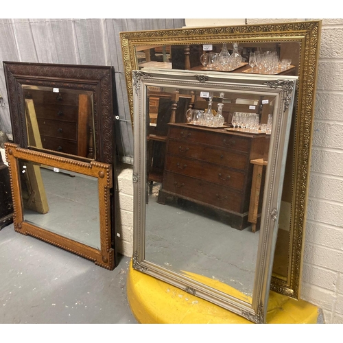 445 - Collection of four mirrors: early 20th century oak with moulded beaded decoration and two modern sil... 