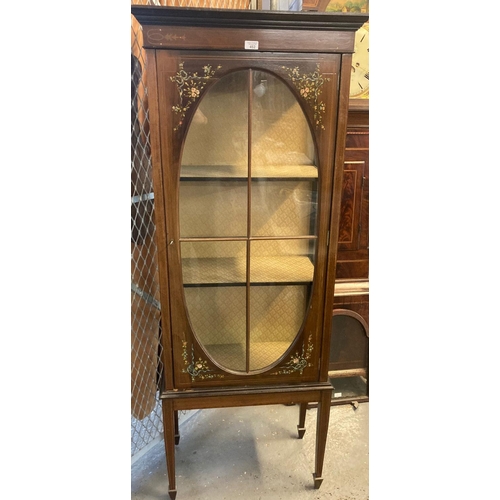 452 - Mahogany single door glazed display cabinet with hand painted floral swag decoration standing on tap... 