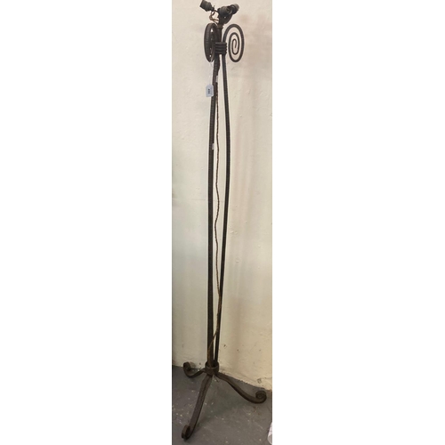 490 - Heavy cast iron tripod lamp base with scroll decoration.  (B.P. 21% + VAT)