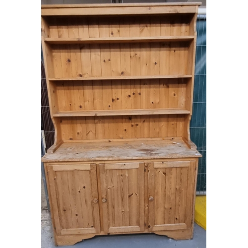 518 - Modern stripped pine kitchen dresser with boarded three shelf rack back and three cupboards to the b... 