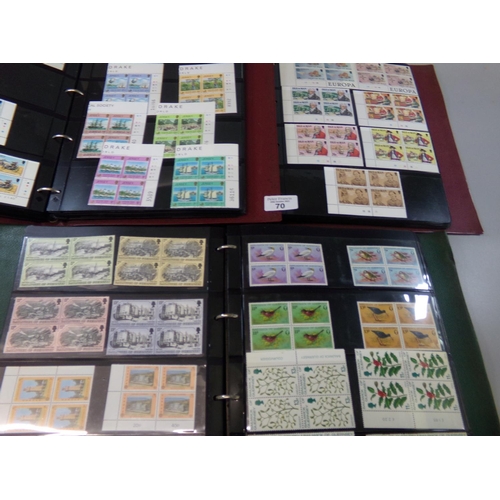 70 - Jersey, Guernsey and isle of Man mint collection of stamps, mostly in blocks of four in three stock ... 