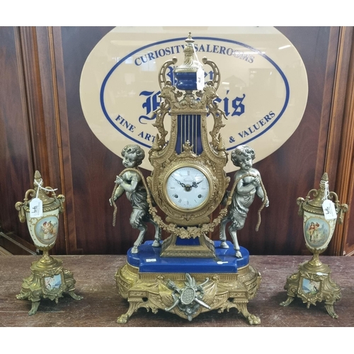 79 - French style Empire design two train ornate brass clock garniture set with satyr figures.  (3)  (B.P... 