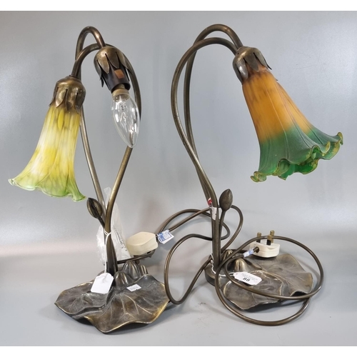 88 - Two similar Art Nouveau style bronzed table lamps with floral iridescent shades.  (2)  (B.P. 21% + V... 