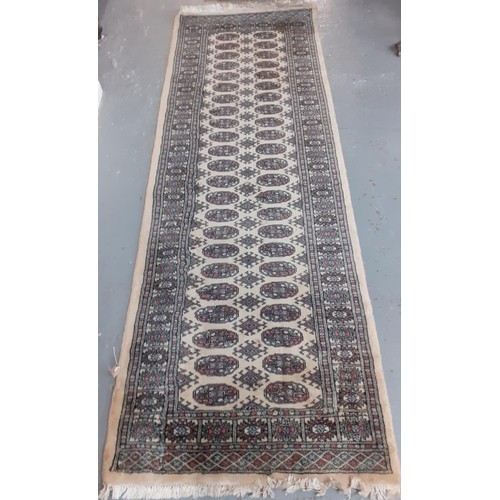 523 - Three modern Bokhara style cream ground runner.  248x84cm approx and 181x64cm approx.  (3)   (B.P. 2... 