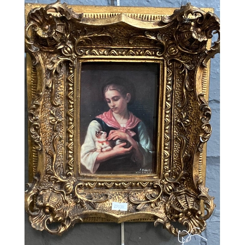 107 - After Bouchon, portrait of a young girl with kitten, a modern reproduction in heavy gilt frame.  The... 