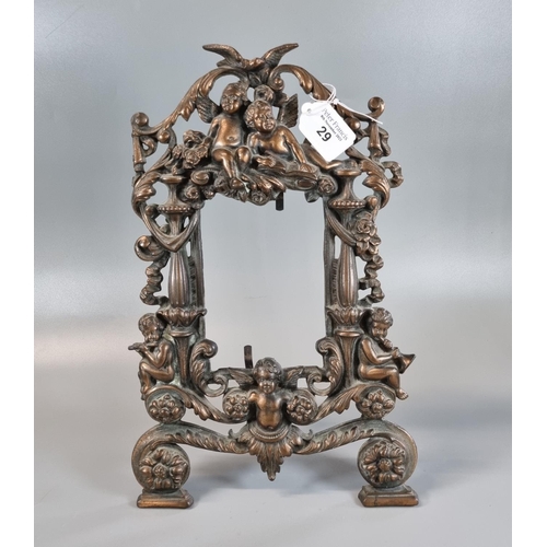 29 - Rococo style oxidised metal openwork photograph/mirror frame decorated with cherubs, birds and folia... 