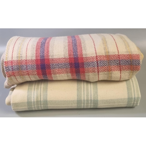 127 - Four vintage woolen blankets/carthen, three check design in various colourways and one striped narro... 