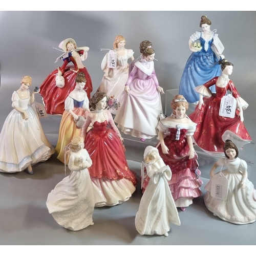 139 - Twelve Royal Doulton bone china figurines to include: 'Autumn Breezes',  'Alexandra', 'Amanda', 'Spe... 