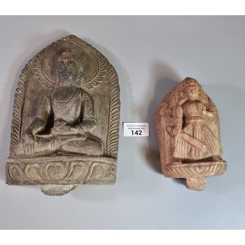 142 - Moulded stone sculpture of Ratnasambhava Buddha together with another carved Buddha style figurine. ... 