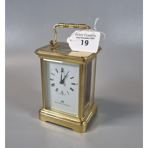 19 - Modern brass carriage clock by Matthew Norman, with key.  (B.P. 21% + VAT)