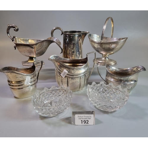 192 - Collection of silver and silver plated items to include: three helmet shaped cream jugs and silver c... 