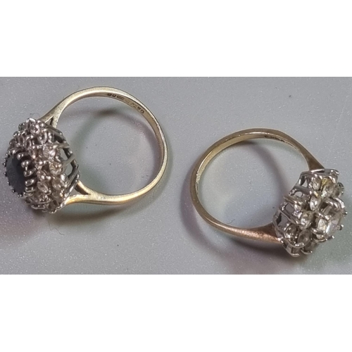 200 - Two 9ct gold clear stone dress rings, one with central blue stone.  6.4g approx.  both size L1/2.  (... 