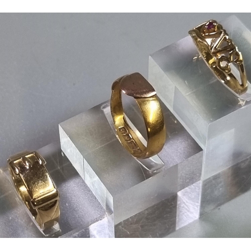 207 - Two 9ct gold rings of buckle design and one marked 'Love' together with another gold signet ring wit... 