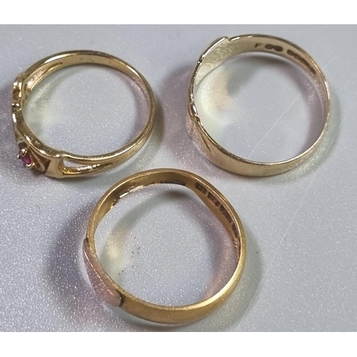 207 - Two 9ct gold rings of buckle design and one marked 'Love' together with another gold signet ring wit... 