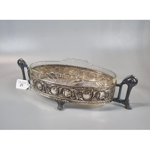 21 - WMF style silver plated two handled centre bowl/dish with glass liner of oval form decorated with re... 