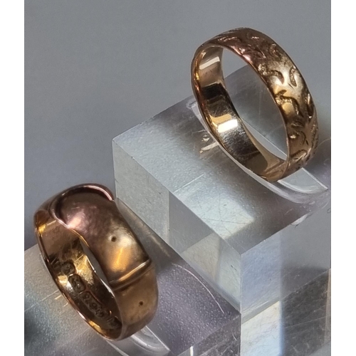 216 - 9ct gold buckle ring together with 9ct gold wedding band.  4.4g approx.  (B.P. 21% + VAT)