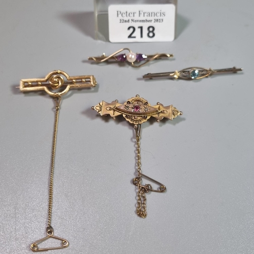 218 - Collection of Victorian/Edwardian brooches, one with diamond chips and ruby, 9ct and 14ct.  total we... 